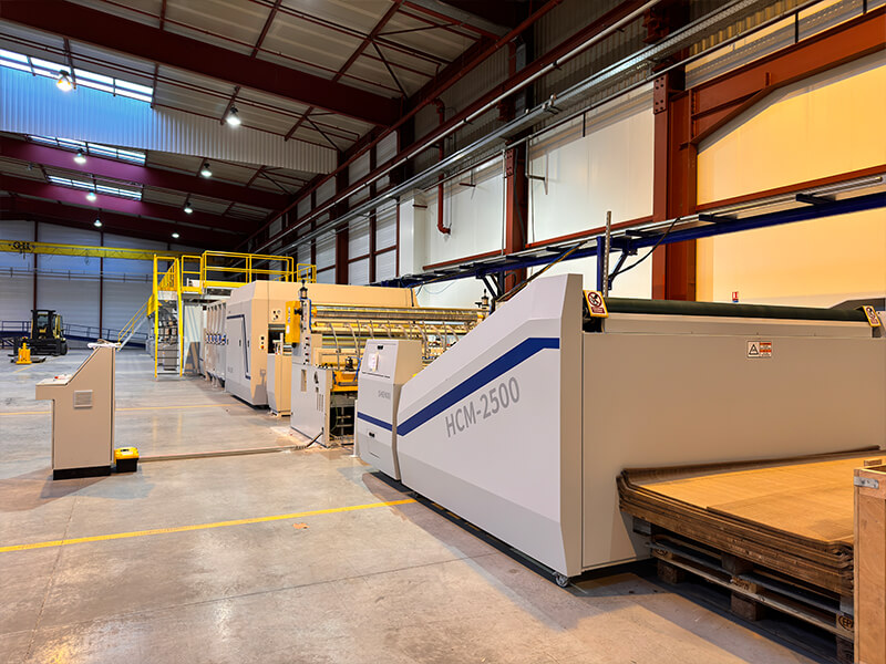 Honeycomb core machine processing lightweight composite materials