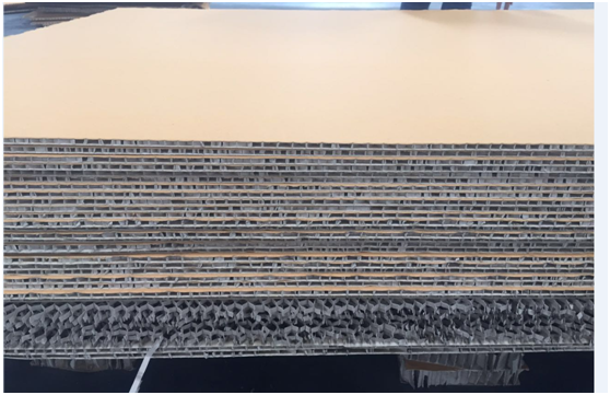 Honeycomb paperboard structural core and packaging applications