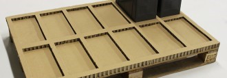 Die-crushed layer pad for batteries
